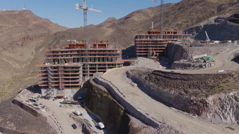 Aerial Rotating Shot of Hillside Construction Cranes in Henderson Las Vegas Stock-Footage 333724948