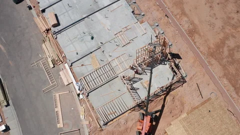 Aerial rotating topdown shot of Las Vegas residential home house construction Stock Footage 308819817