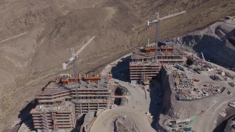 Aerial Rotating View of Hillside Construction Cranes in Henderson Vegas Stock-Footage 333723836