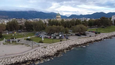 Aerial rotating view of Patras coast with Saint Andrew dome and sea Stock Footage 337462301