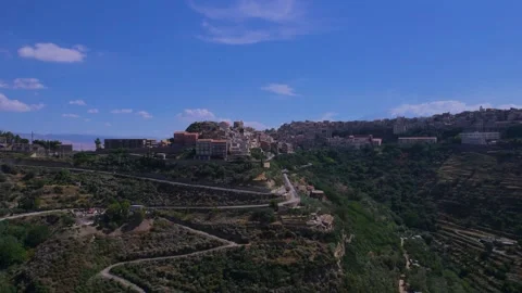 Aerial rotating view of the town of Centuripe in Sicily Stock Footage 296633464