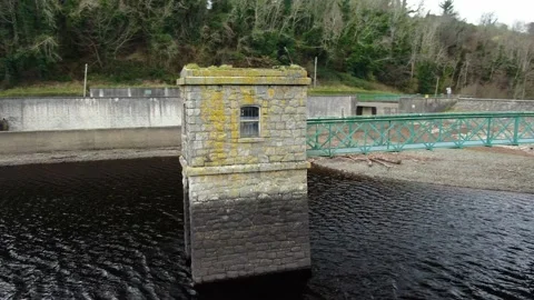 An aerial rotation of an outlet tower at Bohernabreena Reservoir. Stock Footage 171171653