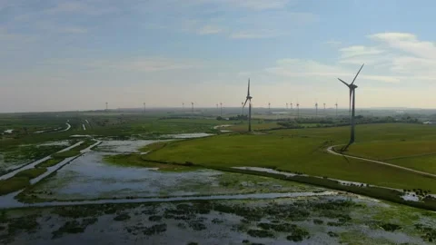 An aerial rotation view of a Wind Farm in Ireland. Stock Footage 155308522