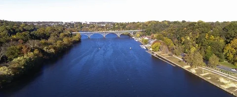 Aerial of rowers down the Schuylkill River in Philadelphia Stock Footage 125988342