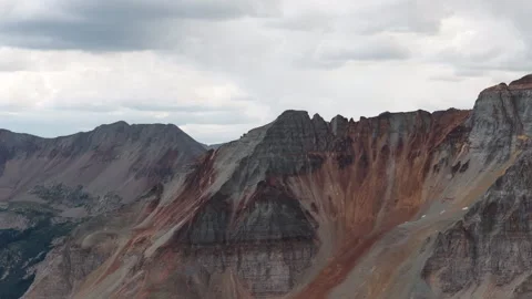 Aerial of rugged mountain cliffs in San Juan National Forest near Telluride Stock Footage 342060283