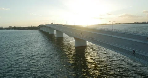 Aerial of runner on highway bridge in St. Petersburg, Florida in Tampa Bay Stock Footage 232909095