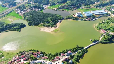 Aerial Rural Landscape with Green Fields and Water Reservoirs Stock Footage 342239405