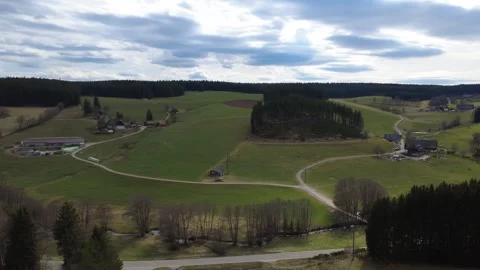 Aerial rural landscape spring fields forest horizon countryside Germany Stock Footage 332372532