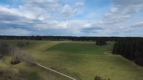 Aerial rural landscape spring fields forest horizon countryside Germany Stock Footage 332372635