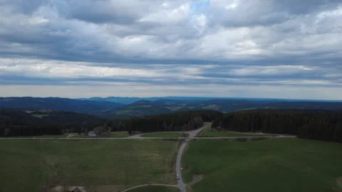 Aerial rural landscape in spring, fields hills and village Germany Stock-Footage 332441687