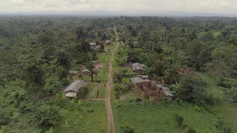 Aerial – rural village in the African jungle, Uganda, Africa Stock Footage
