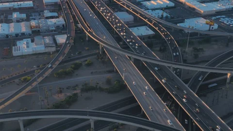 Aerial: Rush hour freeway traffic at sunrise. Phoenix, Arizona, USA Stock Footage 128122267