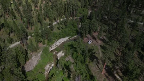 Aerial of RV camped in beautiful Bitterroot national forest in Montana in summer Stock Footage 311940096