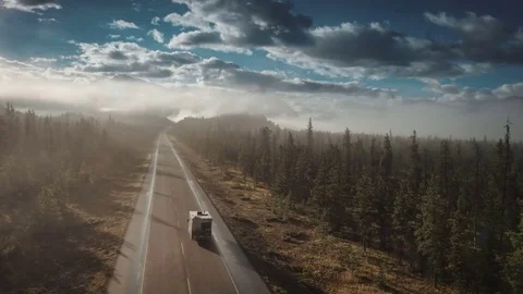 Aerial of rv driving on icefields parkway in jasper Stock Footage