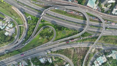 Aerial Saigon Highway Interchange and Curving Traffic Ramps Stock Footage 340970965