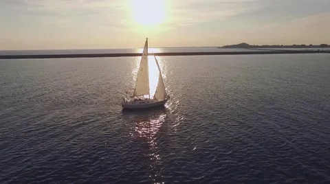 Aerial of sailboat at sunset. Stock Footage 56344152
