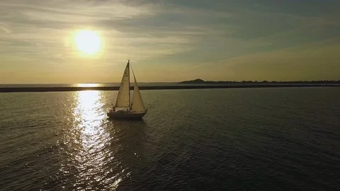 Aerial of sailboat at sunset Stock Footage 103292037