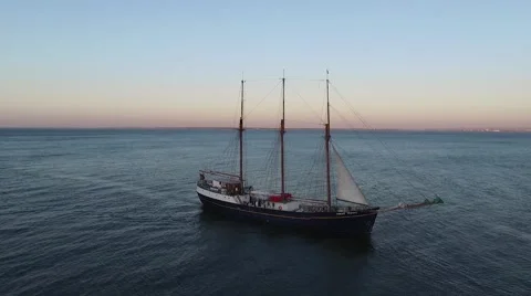 Aerial sailing ship on sunset Stock Footage 59913688