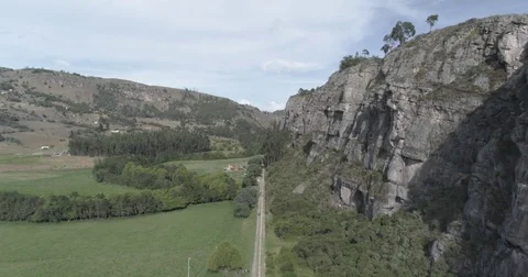 Aerial sails alongside the cliff wall of the rock formation in Suesca Video stock 82402129