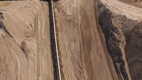 Aerial of salt being processed on conveyor belt at the Monte Kali Stock Footage 116231667