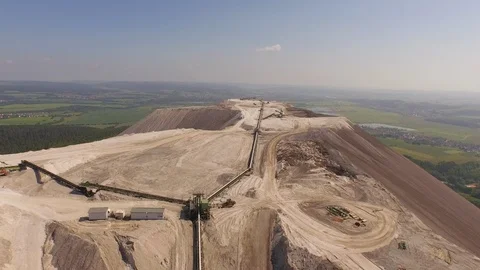 Aerial of salt being processed on conveyor belt at the Monte Kali Stock Footage 116231791