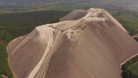 Aerial salt mining on the Monte Kali Stock Footage 116231970