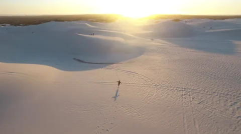 Aerial of Sand Dunes with Runner Stock Footage 64998940
