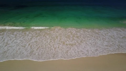 Aerial sandy beach and waves Stock Footage 74649388