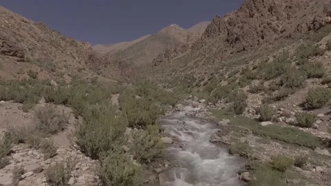 Aerial scene with drones. Camera forward on the edge of the mountains. Stock Footage 156988039