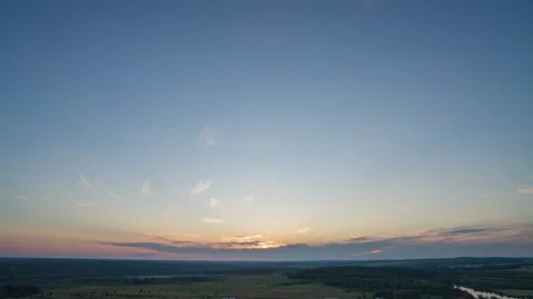 Aerial scene of high panoramic view at sunset. Beautiful clouds blue sky, sun Stock Footage 169325648