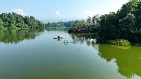 Aerial Scene of Rafts and Active Fishermen on the Lake Stock Footage 309913995