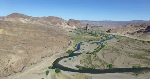 Aerial scene of river valley surrounded by cliffs, mountains. High view, panoram Видео 63882177