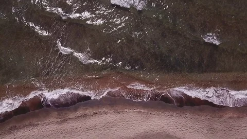 Aerial scenes, waves moving on a sand beach, background, graphic  Stock Footage 106527768