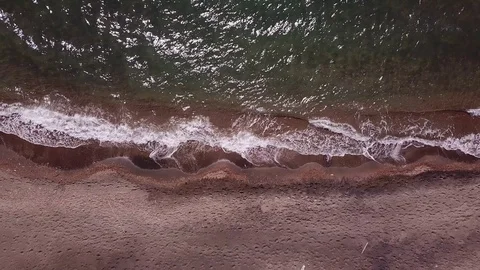 Aerial scenes, waves moving on a sand beach, background, graphic  Stock Footage 106532367