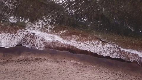 Aerial scenes, waves moving on a sand beach, background, graphic  Stock Footage 106540388