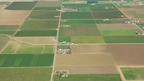 Aerial of scenic patchwork crops fields Central Valley Stock-Footage 91545679