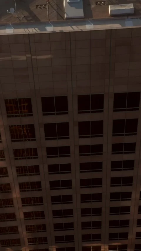 Aerial Scenic Tilt down over Downtown Skyscraper big office building revealing d Stock Footage 337411936