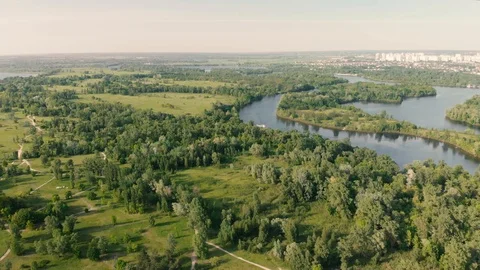 Aerial scenic view reserve park zone with river and cityscape on horizon Stock-Footage 108421153