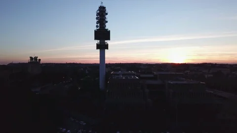 Aerial scenic view of a Telecommunication tower at sunset dishes and antennas Stock Footage 100206751
