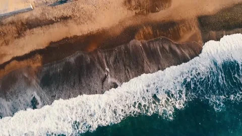 Aerial sea and Aerial View Waves Break On Italian  Beach At Sunset Stock Footage
