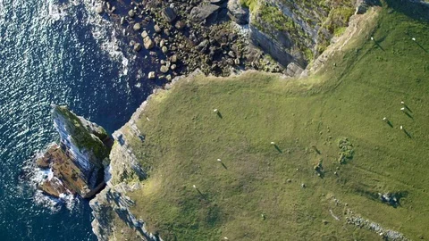 Aerial: Sea stack, Isle of Man. 4K Stock Footage 89793279