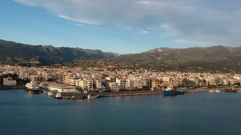 Aerial seaside view over seaside city of Kalamata, Greece at sunset Stock Footage 164609657