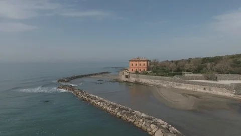 Aerial sequence of old castle on the beach in Italy - Castello Odescalchi Stock Footage 89831606