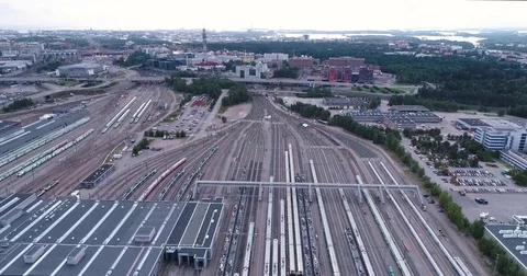 Aerial sequence. View of train yard with lots of train and railways. Video stock 79807869