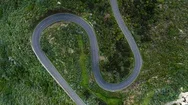 Aerial Of Serpentine Road In Mountains Stock Footage