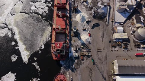 Aerial shipping terminal operations during winter in canada Stock Footage 329452416