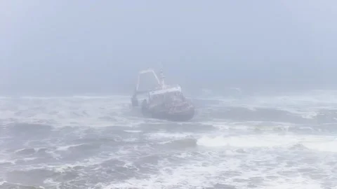 Aerial shipwreck on Namibia Skeleton Coast with trawler gantry Stock Footage 341424128