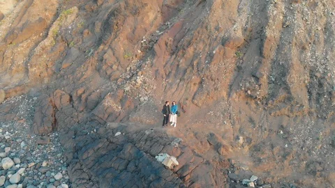 Aerial shoot. The camera moves away from the man and woman who stand at the Stock Footage 108755224