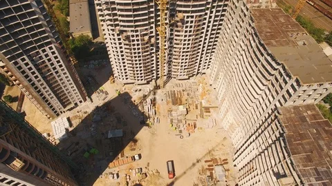 Aerial shoot of construction site with tower cranes. Construction drone footage Stock Footage 91453774