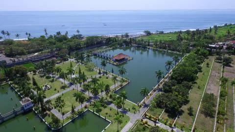 Aerial shoot green garden with sea background Stock Photos